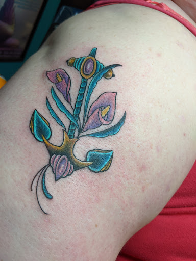 Explore ring tattoo cover up ideas, creative tattoo ideas in Hendersonville, available at Anchor Tattoo Parlor