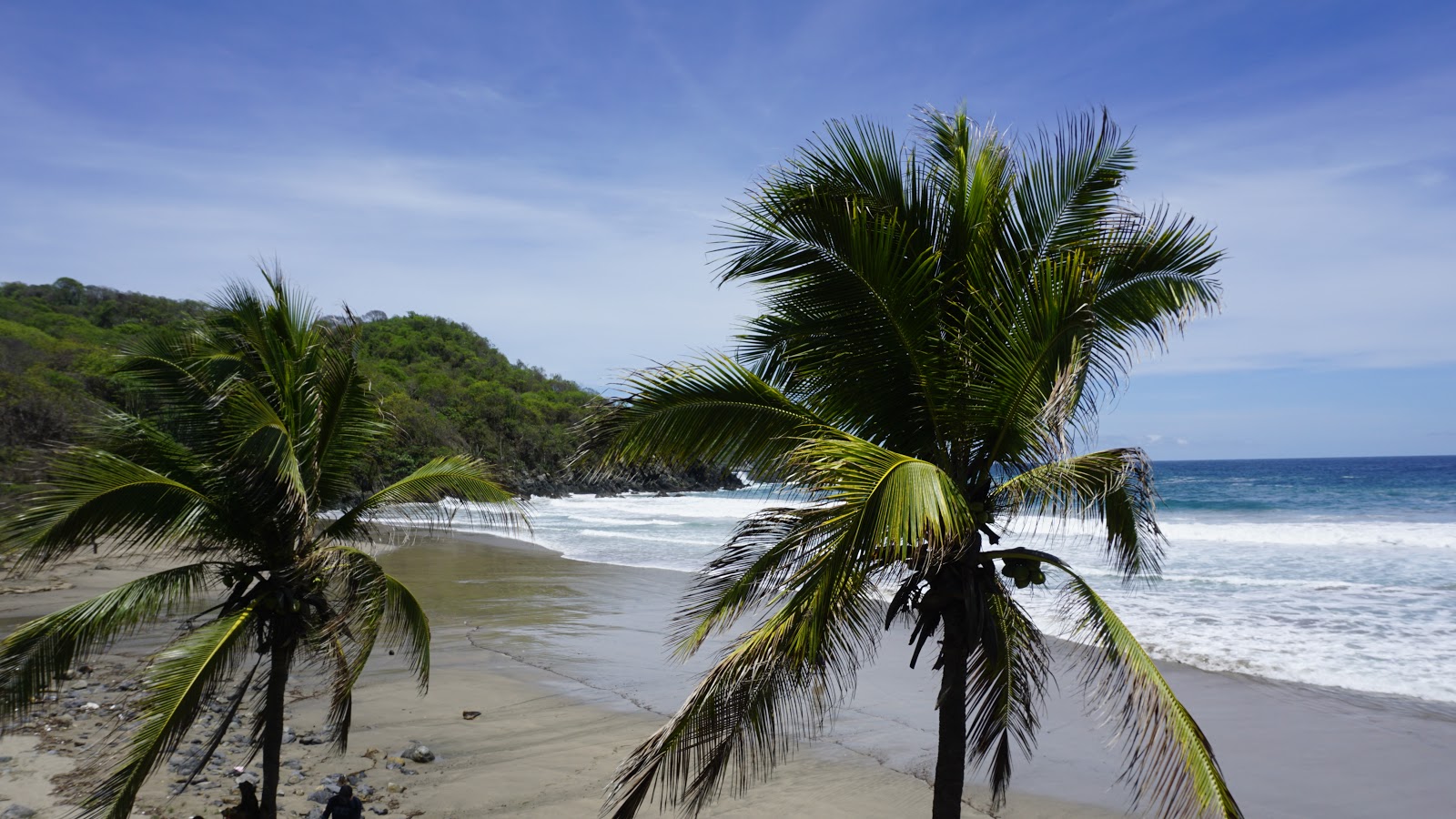 Zdjęcie Playa Majahua Zihuatanejo z powierzchnią jasny piasek