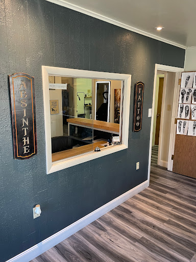 Explore world tattoo ideas, creative tattoo ideas in Sunbury, available at Absinthe Tattoo