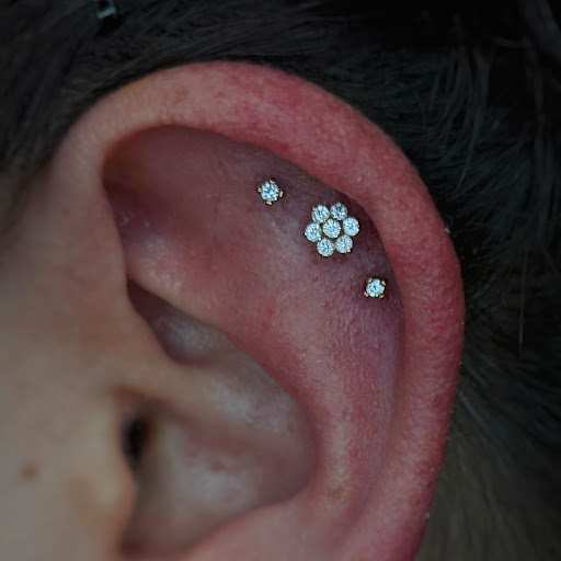 Explore dirt bike tattoo ideas, creative tattoo ideas in Coeur D Alene, available at Relic Moon Fine Jewelry & Body Piercing