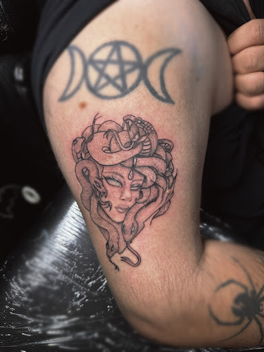 Explore male stomach tattoo ideas, creative tattoo ideas in Lavonia, available at New Moon Tattoo LLC