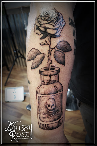 Explore small neck tattoo ideas, creative tattoo ideas in Minocqua, available at Whisky Rose Tattoo Parlor