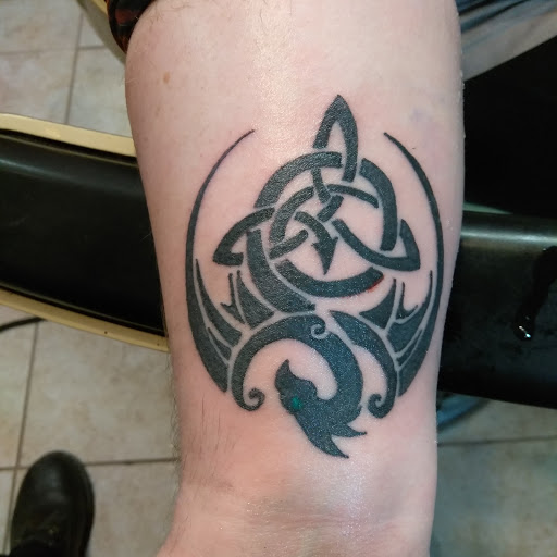 Explore name tattoo ideas for guys, creative tattoo ideas in Raymond, available at Bobs Tattoo Paradise