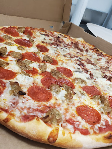 #9 best pizza place in Syracuse - Tangy Tomato
