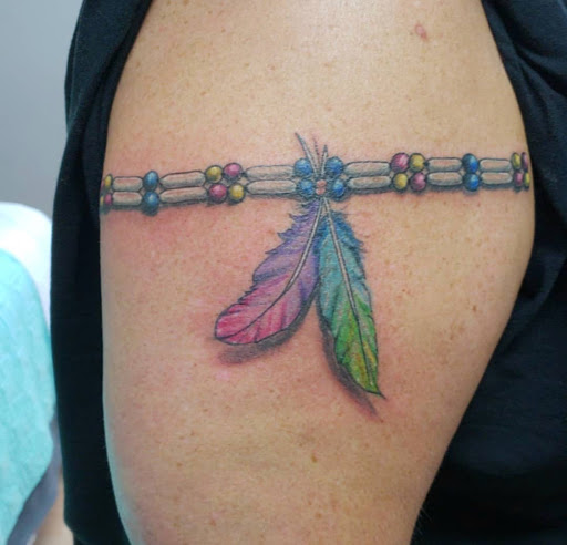 Explore spinal tattoo ideas, creative tattoo ideas in Kenosha, available at Kenosha Tattoo Company