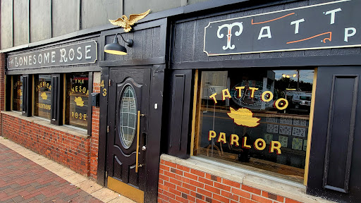 Explore punisher tattoo ideas, creative tattoo ideas in Geneva, available at The Lonesome Rose Tattoo Parlor