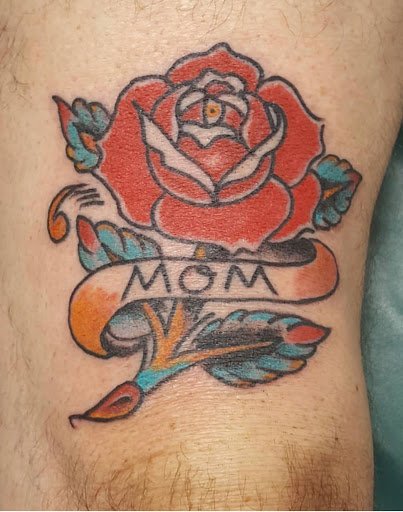 Explore tattoo ideas with your child's name, creative tattoo ideas in Kansas City, available at Golden Stag Tattoo and Gallery