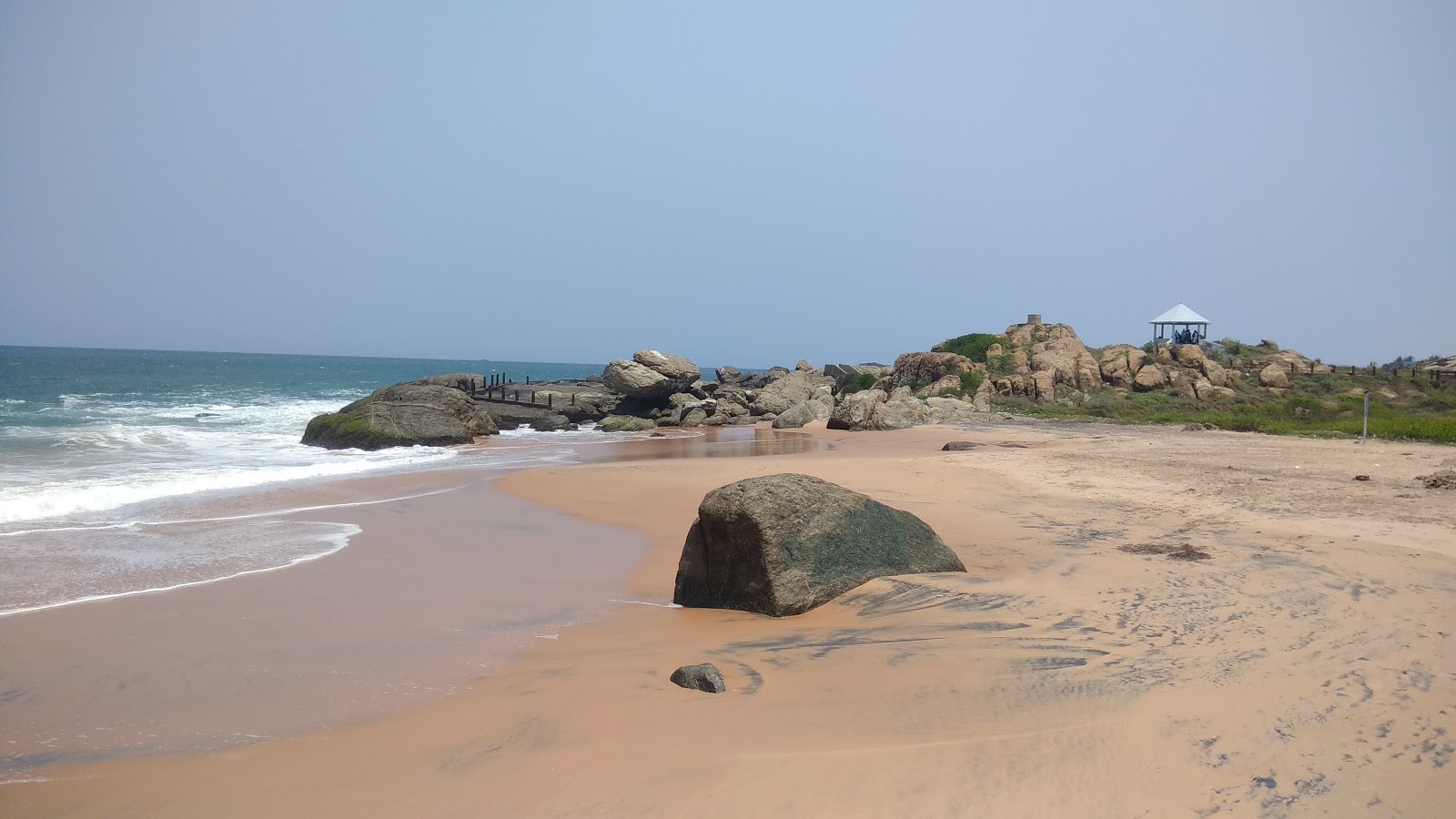 Foto von Muttom Beach mit geräumige bucht