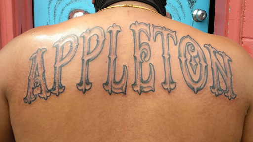 Explore tooled leather tattoo ideas, creative tattoo ideas in Martins Ferry, available at Hot Rod Tattooing