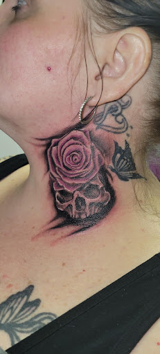 Explore god of war ragnarok tattoo ideas, creative tattoo ideas in Angola, available at Hoodlum Ink