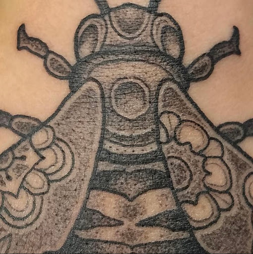 Explore lion tattoo ideas, creative tattoo ideas in Keene, available at Noble Thorn tattoo room