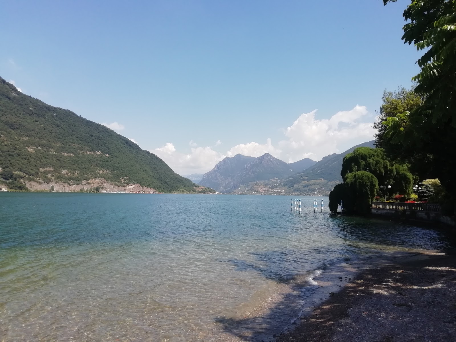 Foto von Spiaggia Libera Carini mit beiger sand & steine Oberfläche