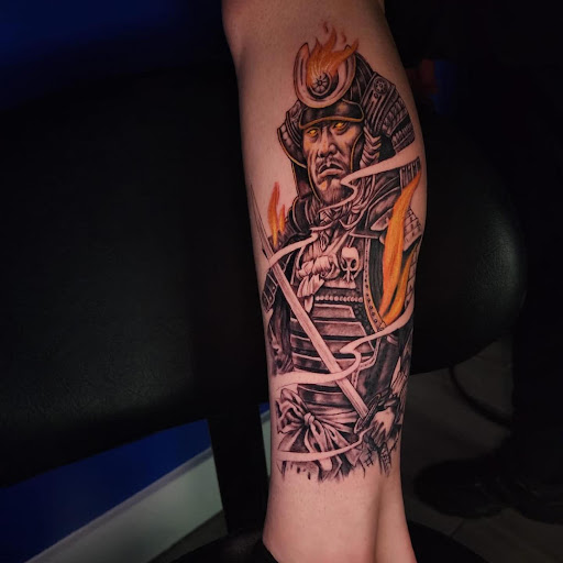 Explore magician tattoo ideas, creative tattoo ideas in Skowhegan, available at tzi Tattoos by Mcvid Inks