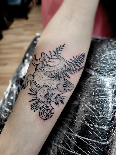 Explore tattoo ideas on forearm, creative tattoo ideas in Benton, available at Spectrum Tattoo