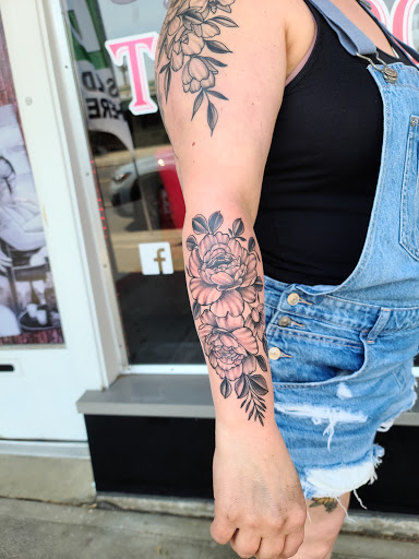 Explore water sign tattoo ideas, creative tattoo ideas in Clarkston, available at Rogue Tattoo