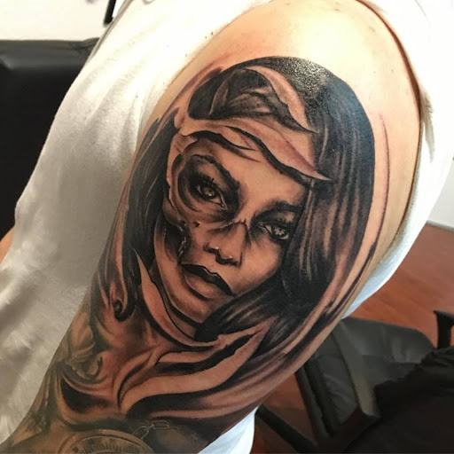 Explore men's knuckle tattoo ideas, creative tattoo ideas in Redwood City, available at Gods & Titans Tattoo