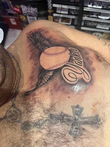 Find owl tattoo ideas for guys for your next unique tattoo in Bronx at Anarchy Tattoo Studios