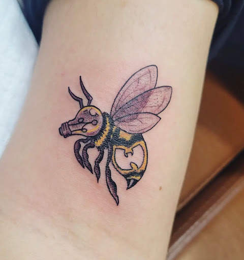 Explore mens tricep tattoo ideas, creative tattoo ideas in Mount Juliet, available at Division Street Tattoo Company