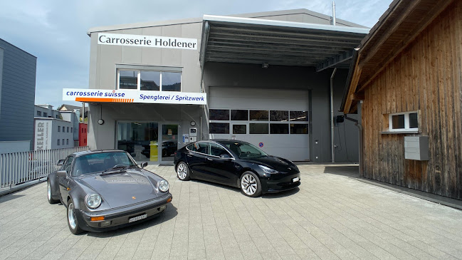 Rezensionen über Carrosserie Holdener + Abschleppdienst Altendorf GmbH in Freienbach - Autowerkstatt