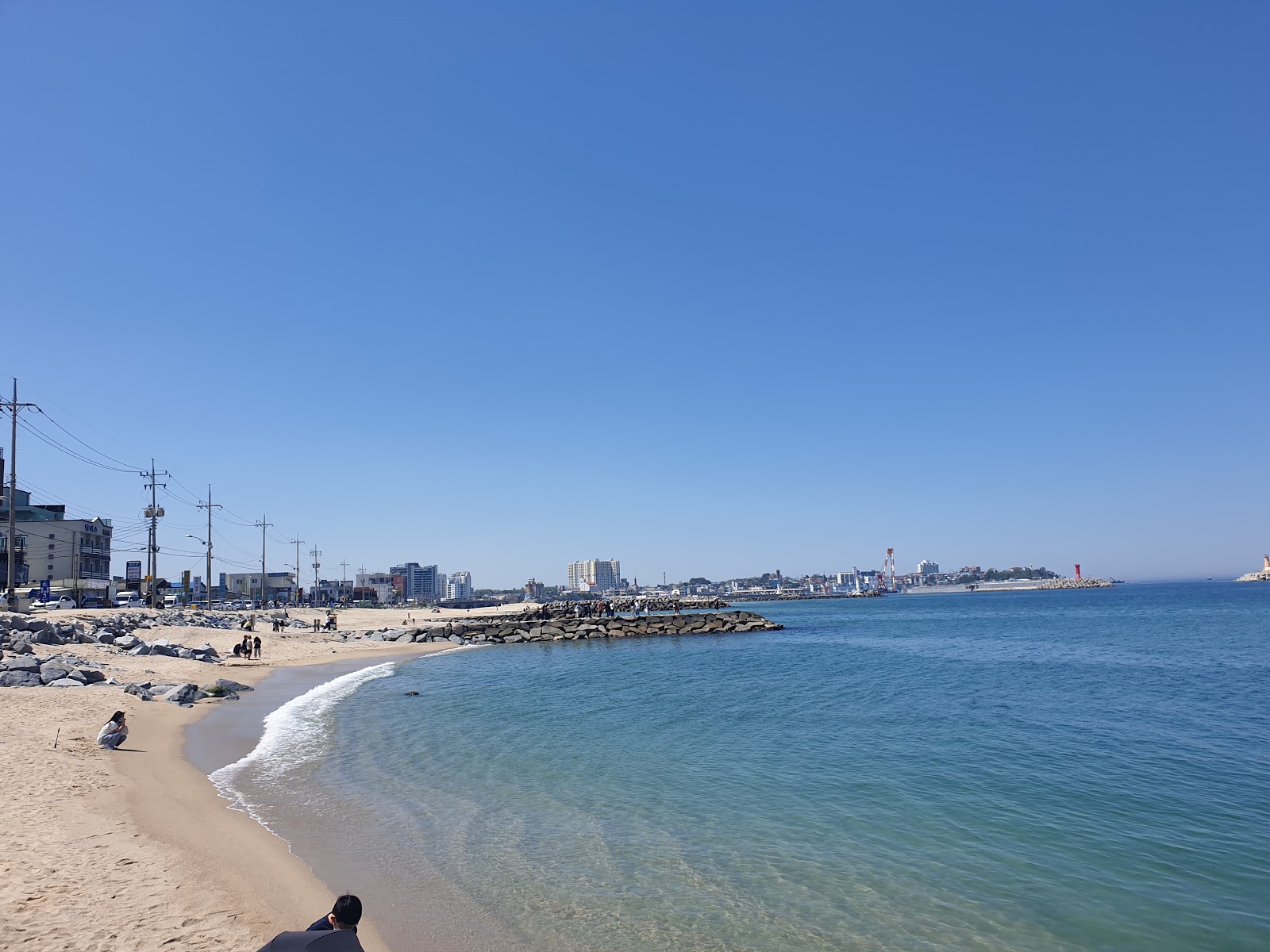 Yeongjin Beach'in fotoğrafı geniş plaj ile birlikte