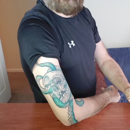 Explore sleeve cover up tattoo ideas, creative tattoo ideas in Bethlehem, available at Obsidian Tattoo and Piercing Parlor