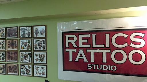 Explore mens family tattoo ideas, creative tattoo ideas in Benton, available at Relics Tattoo Studio