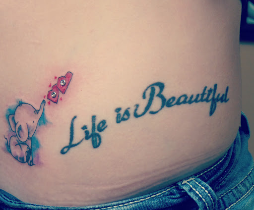 Explore infinity name tattoo ideas, creative tattoo ideas in Conway, available at Primal Urge Tattoos