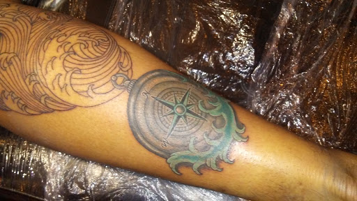 Tattoo Shop «Salvation Tattoo Lounge», reviews and photos, 1302 N University Dr, Coral Springs, FL 33071, USA