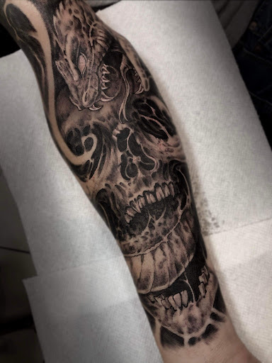 Explore back of ear tattoo ideas, creative tattoo ideas in Melbourne, available at Bonnie n Clyde Tattoo Studio