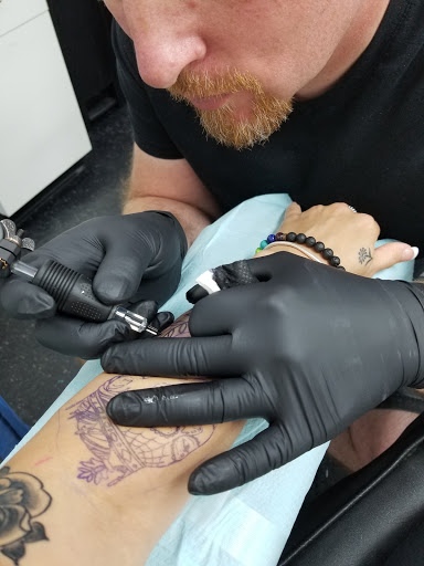 Explore family sleeve tattoo ideas for males, creative tattoo ideas in Elyria, available at Tried and True Tattoo