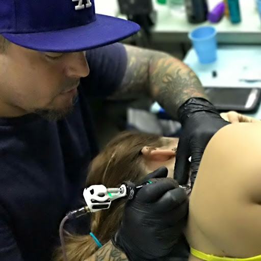 Explore tattoo ideas space liquid tattoo, creative tattoo ideas in San Diego, available at High Class Tattoo SD