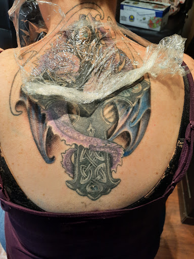 Explore mother son tattoos ideas, creative tattoo ideas in Fernley, available at Elevated Arts Tattoo Parlor