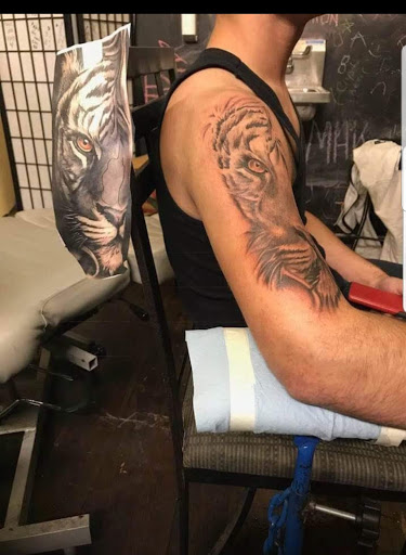 Explore pacemaker tattoo ideas, creative tattoo ideas in Texarkana, available at Illusions Mafia Ink Tattoo Studio