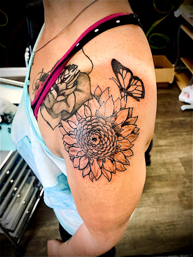 Explore bartender tattoo ideas, creative tattoo ideas in Lake City, available at Crooked Spines Tattoo Studio