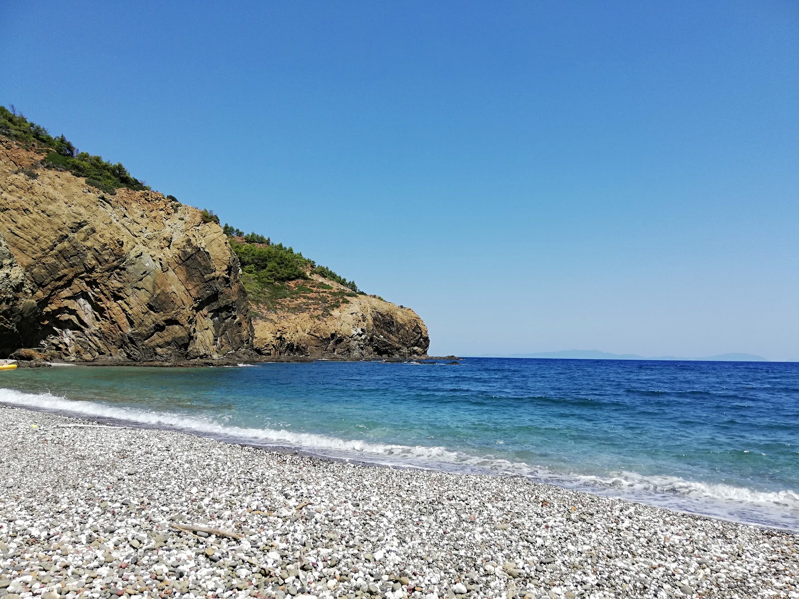 Fotografija Daphnopotamos beach z turkizna čista voda površino