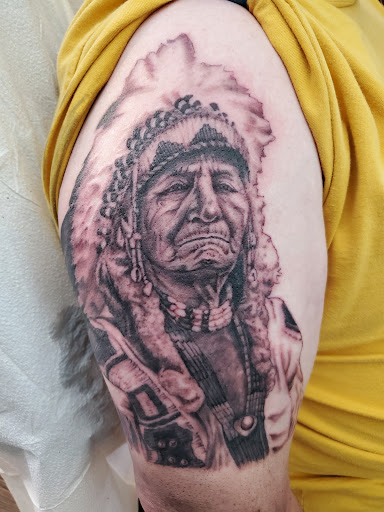 Explore sleeve tattoo cover up ideas, creative tattoo ideas in Peoria, available at Guerrilla Ink Tattoos