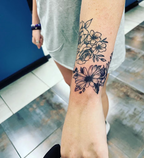 Find robot tattoo ideas for your next unique tattoo in Foley at Symbolic Ink Tattoo Studio