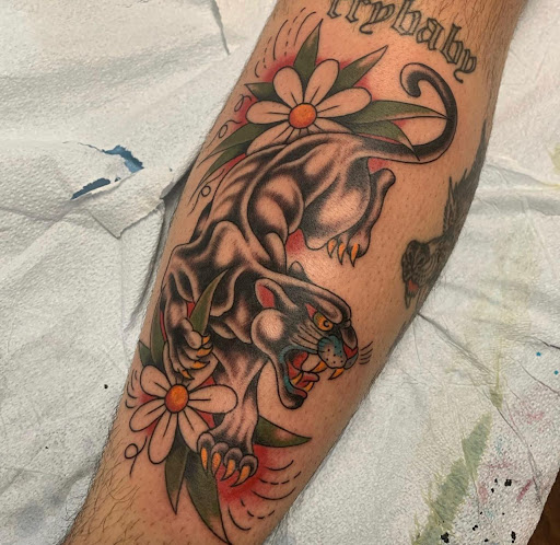 Explore massage therapy tattoo ideas, creative tattoo ideas in Marietta, available at The Queen Bee Tattoo and Piercing Parlour