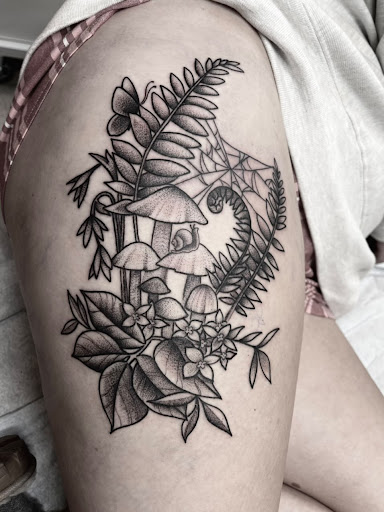 Find leg tattoo ideas for guys for your next unique tattoo in Arlington at Benchmark Tattoos
