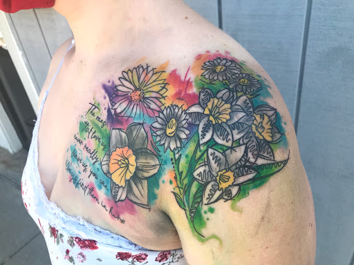 Explore calf muscle tattoo ideas, creative tattoo ideas in Mount Pleasant, available at Bryan Briggs Iron Tiger Tattoos