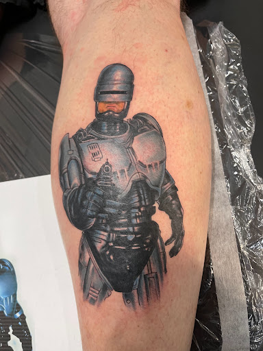 Explore cannabis tattoo ideas, creative tattoo ideas in Bloomington, available at Crimson Breed Tattoo Studio