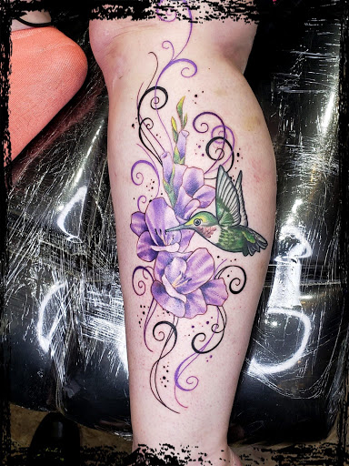 Explore wedding band tattoo ideas, creative tattoo ideas in Springfield, available at Dark Ship Tattoo inc