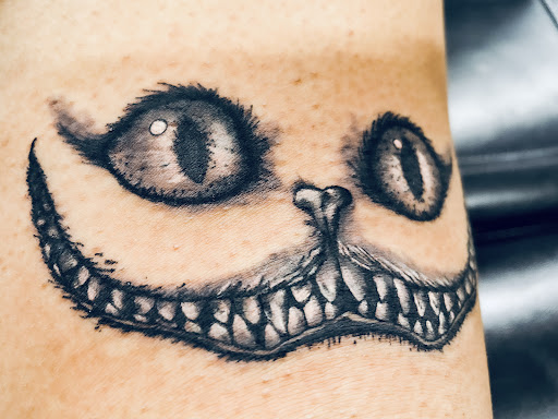 Explore women's lower back tattoo ideas, creative tattoo ideas in Mandan, available at ten32ink - tattoos