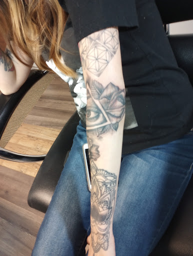 Explore ball python tattoo ideas, creative tattoo ideas in Rapid City, available at Bradley Ink