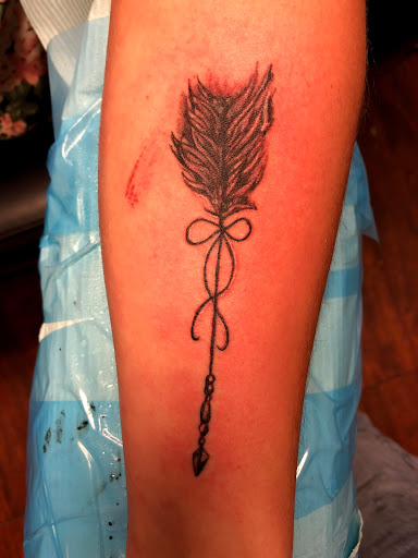 Explore tattoo ideas that represent family, creative tattoo ideas in Seymour, available at American Gypsy Tattoo Corp.