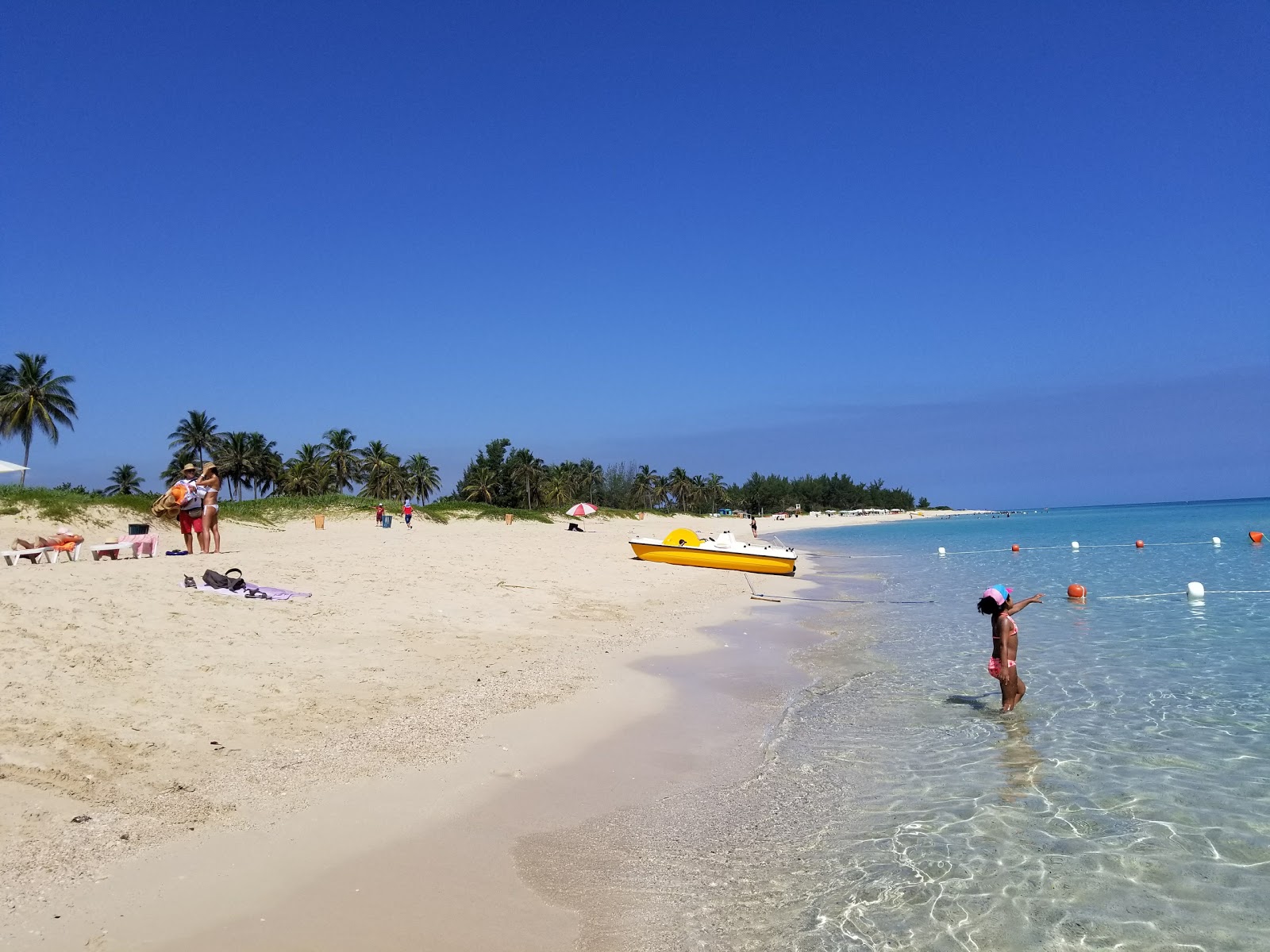Foto van Playa Megano met helder zand oppervlakte