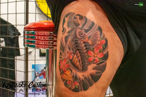 Explore hands tattoo ideas, creative tattoo ideas in Salisbury, available at Keepsake Custom Tattoo & Body Piercing Laser Tattoo Removal