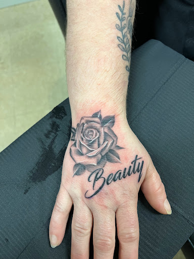 Explore side tattoo ideas for guys, creative tattoo ideas in Eden, available at Slicks Tattoo Studio