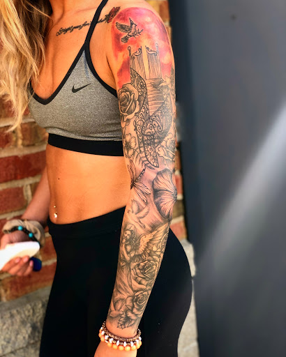 Explore hawk tattoo ideas for females, creative tattoo ideas in Batavia, available at The Pretty Pin-Up Tattoo Parlor