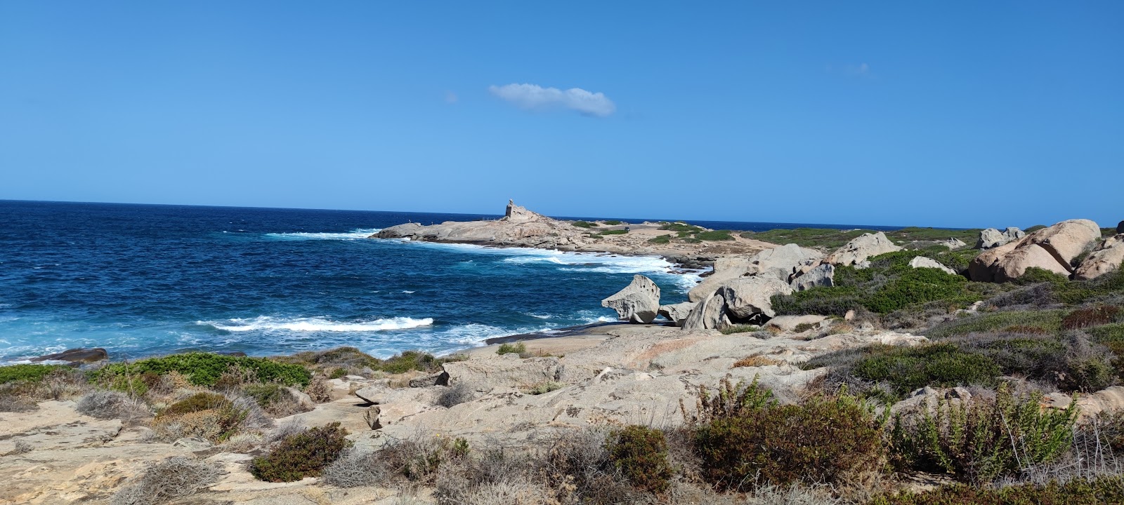 Photo de Caldanu Beach avec roches de surface